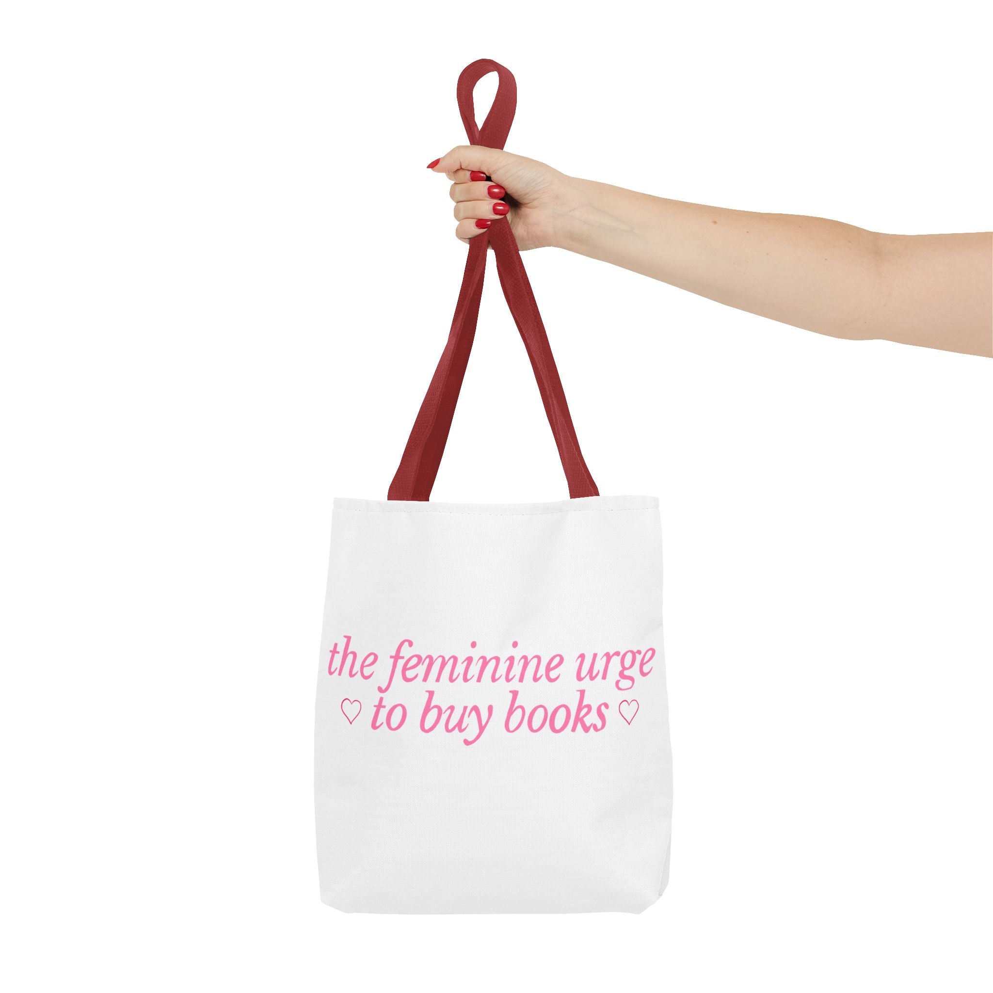 Book Lover Tote Bag — “the feminine urge to buy books” Pink Script