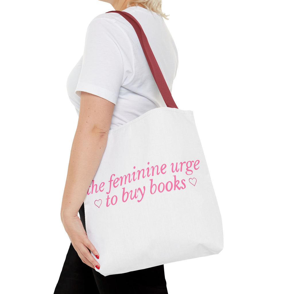 Book Lover Tote Bag — “the feminine urge to buy books” Pink Script