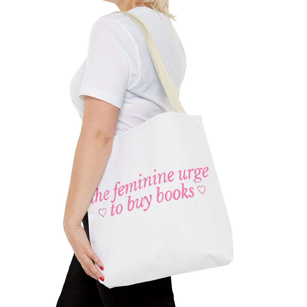 Book Lover Tote Bag — “the feminine urge to buy books” Pink Script
