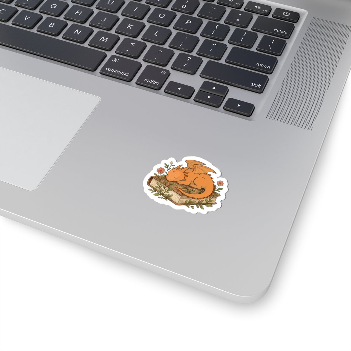 Sleeping Dragon Sticker — Cute Orange Dragon Napping on Book, Cozy Fantasy Laptop Decals